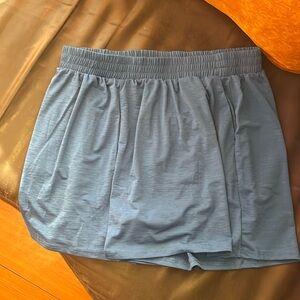 Blue shorts with pockets.
